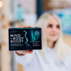 Kvinne med multivitaminer